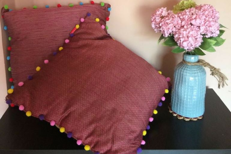 Get Cushiony with Colourful Pom Poms